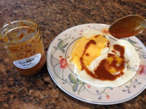 Eggs with enchilada sauce