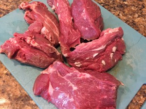Trim lamb of fat and cut into large lobes