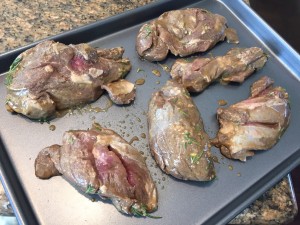 Place marinated meat on cookie sheet